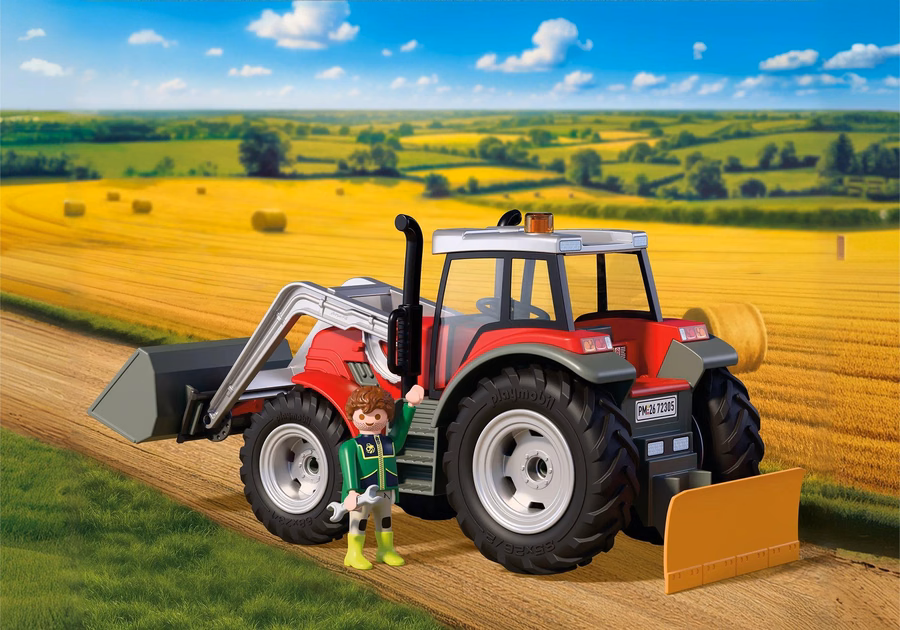 Grote tractor met hooibalen